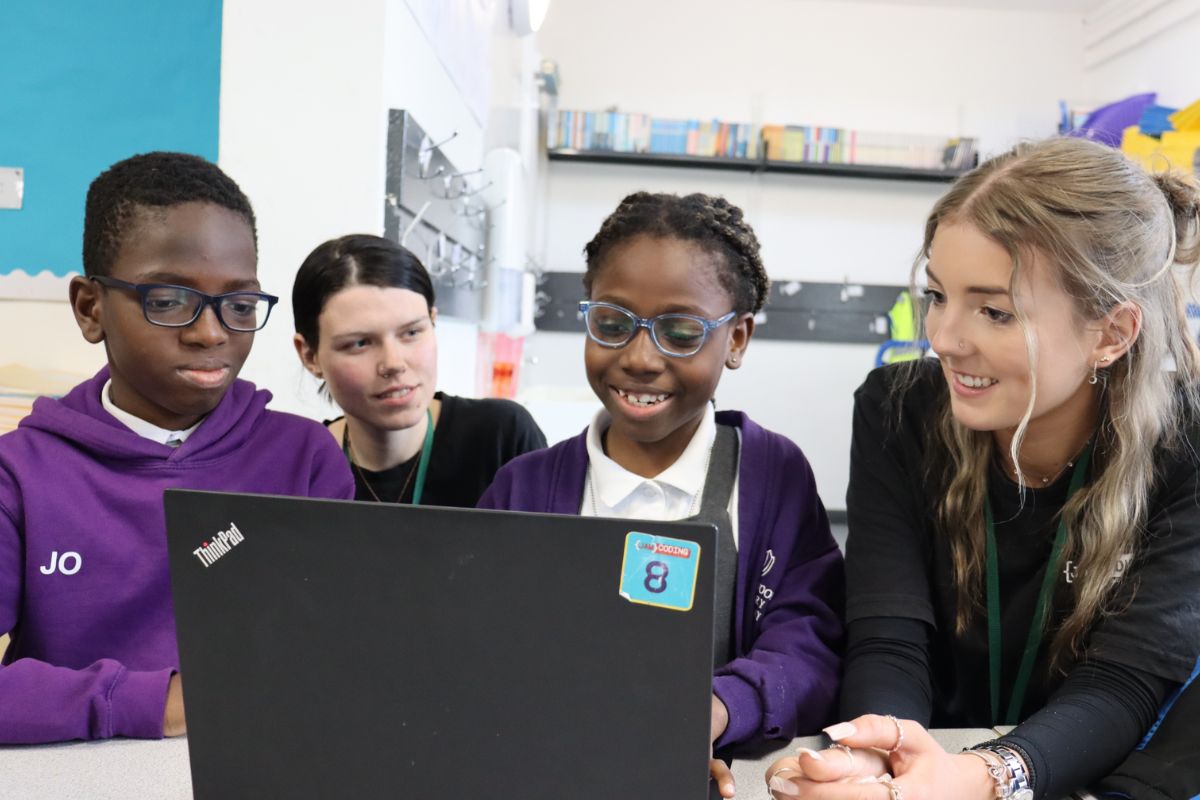 Teacher teaching bespoke computing curriculum